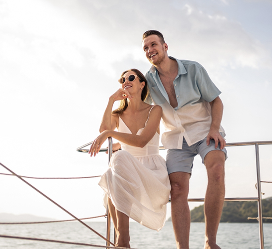 couple smiling on a boat